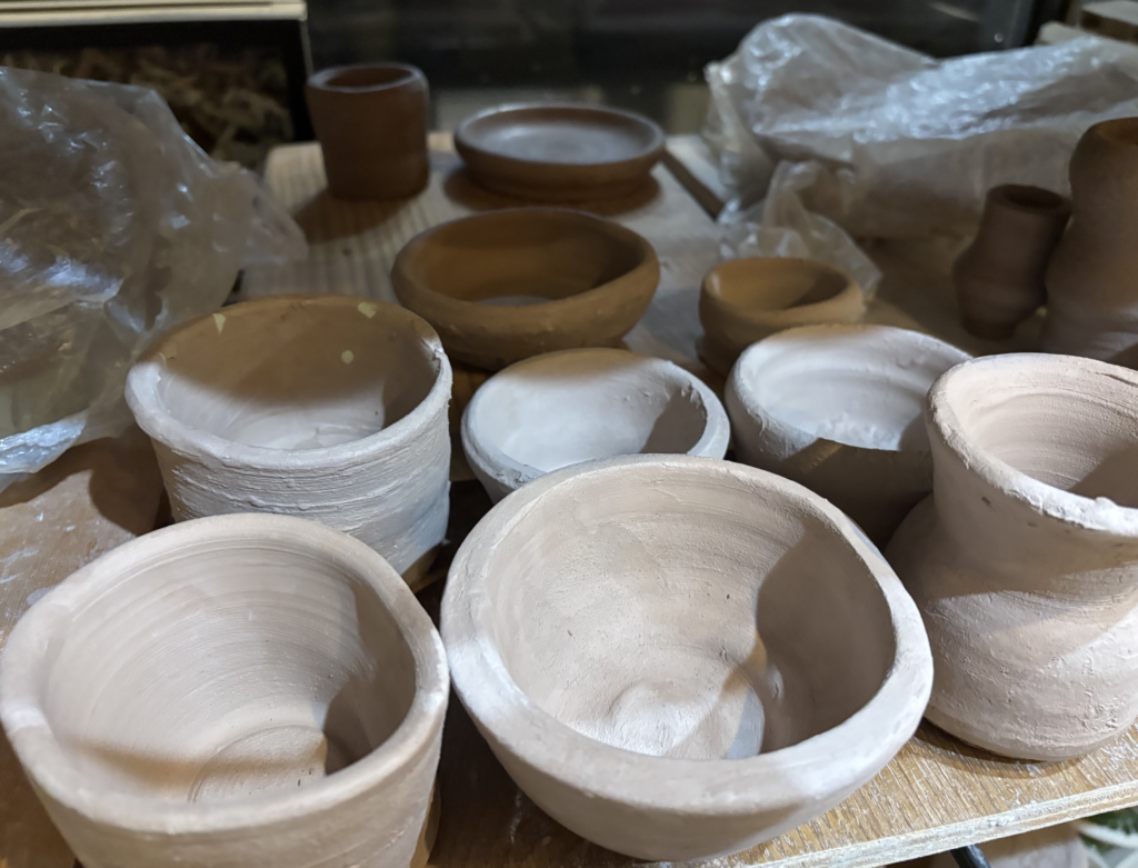 Several badly made pottery pieces